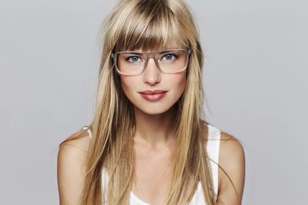 young woman in glasses